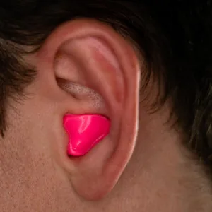 Custom solid earplug molded and worn in the ear